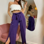 Fioletowe spodnie damskie Sensual Woman, szerokie nogawki, rozcięcia, wiązanie w talii – idealne na święta