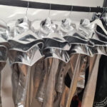 futuristic-armor-bodysuits-collection-on-rack